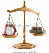 Stock-photo-stock-photo-of-scales-in-equal-balance-holding-a-clock-left-on-the-and-money-on-the-right-59320429